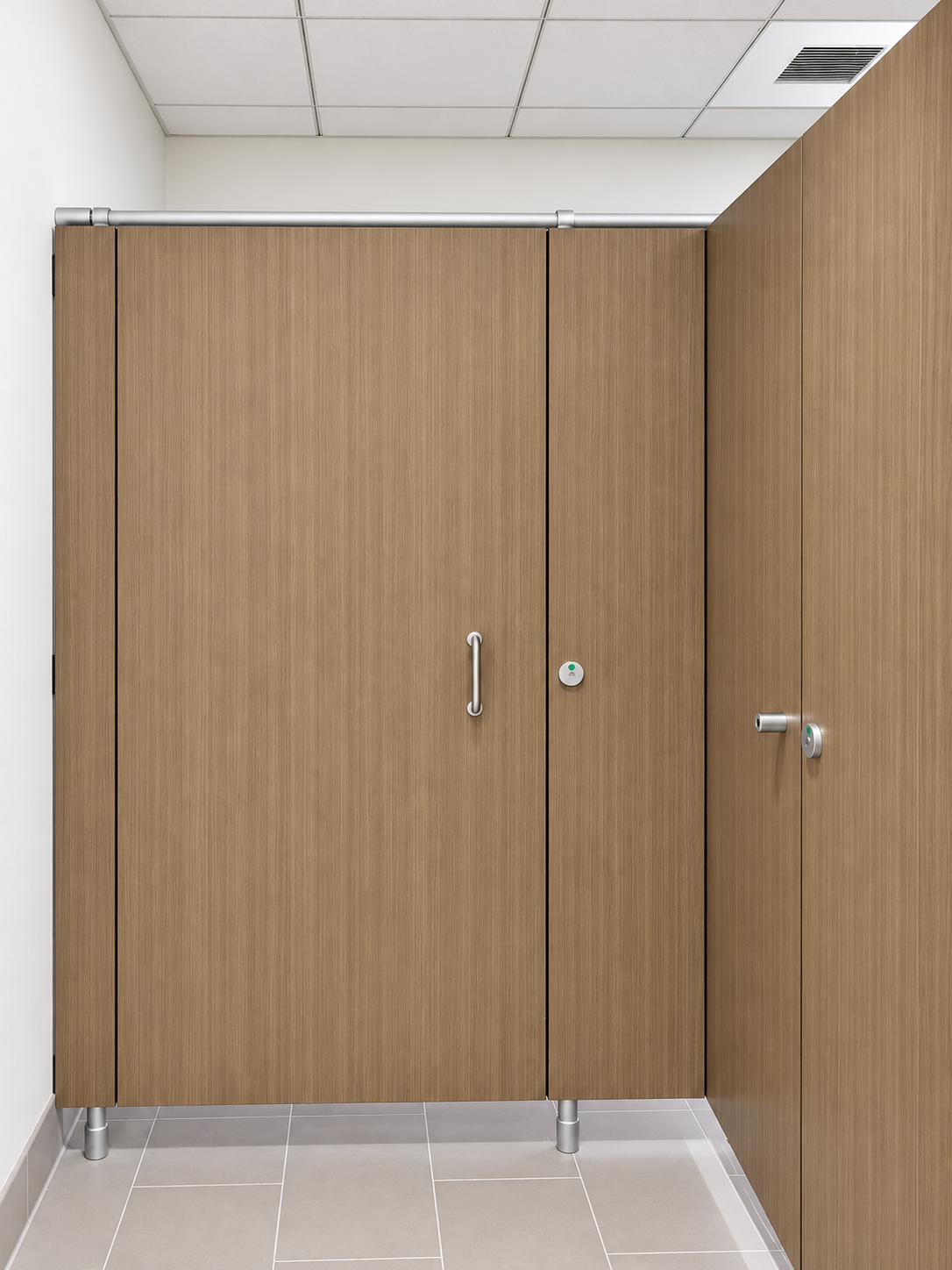 PRIVACY 2000 restroom partition installation with a clean wood-look front